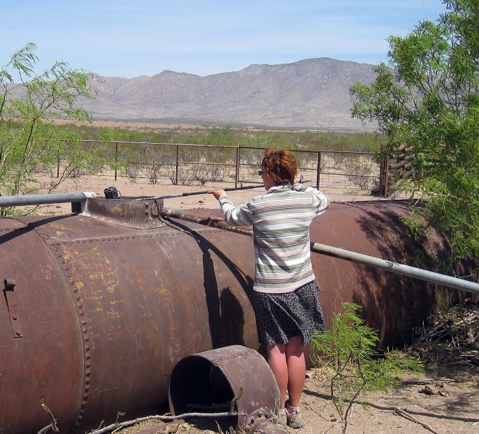 M at Bee Tank with stick